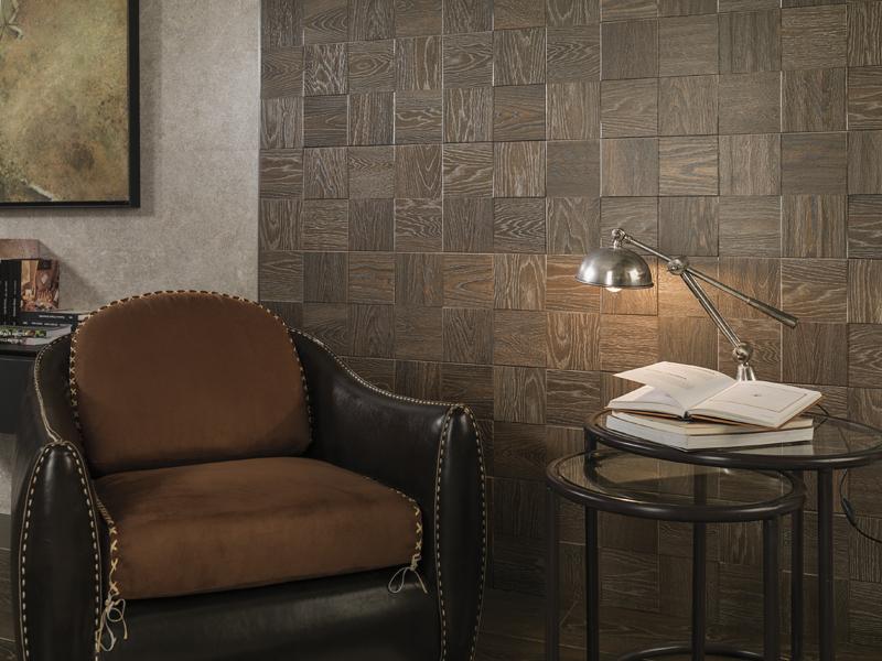 Junto al formato tablón en gres porcelánico para el pavimento, London presenta el revestimiento para paredes Taco, un mosaico de piezas cuadradas con diferentes volúmenes que parecen encajar a la perfección.